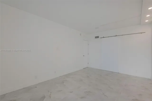 a bathroom with a shower and a toilet