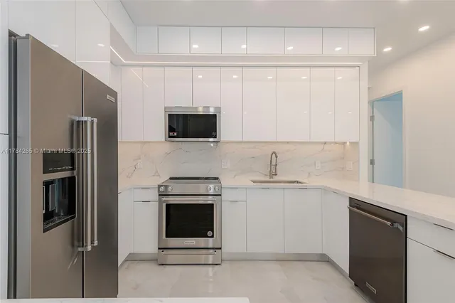 a view of a city from a balcony with outdoor space