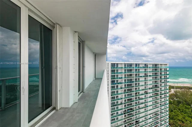 a view of a lake with a garden and lake view