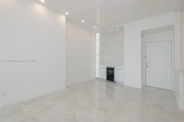 a view of a kitchen with an oven and cabinets