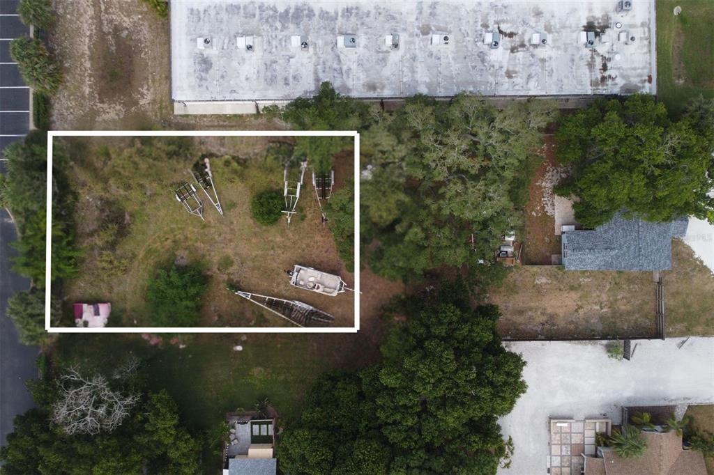 0 143rd Street North Largo, FL 33774 - Photo 2 of 6 an aerial view of a residential houses with outdoor space