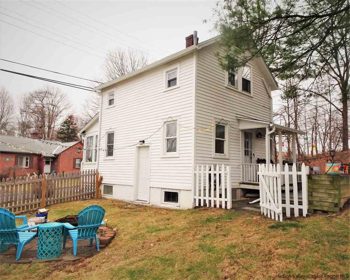153 Clay Road Ulster Park, NY 12487 - Photo 22 of 25 a view of a house with a yard and deck