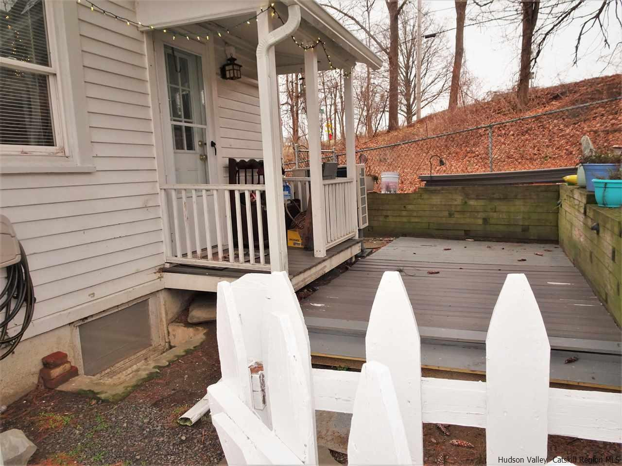 153 Clay Road Ulster Park, NY 12487 - Photo 23 of 25 a view of a patio with two chairs in a patio