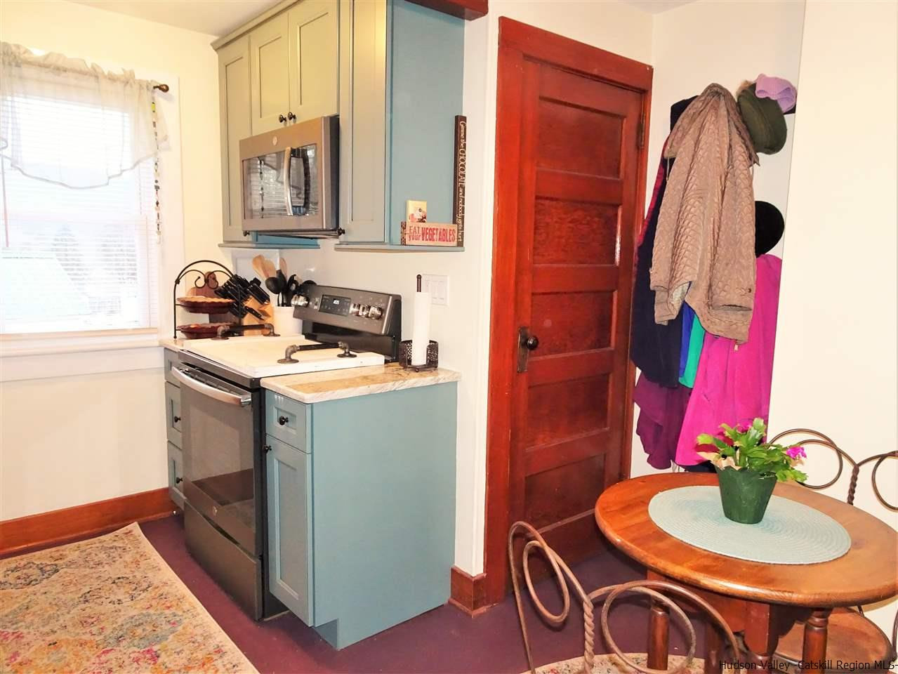 153 Clay Road Ulster Park, NY 12487 - Photo 6 of 25 a bathroom with a sink and a mirror