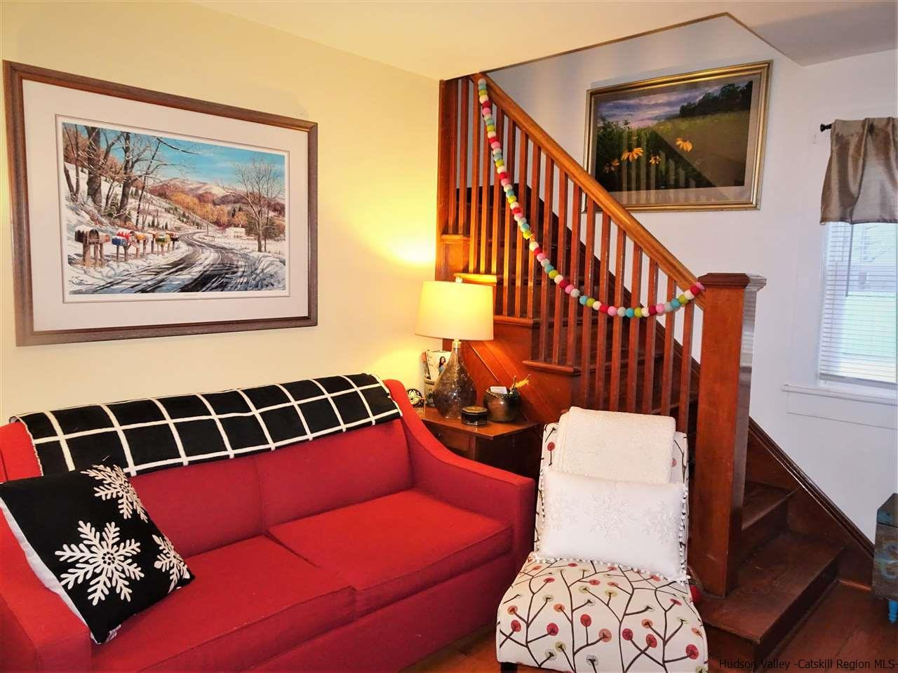 153 Clay Road Ulster Park, NY 12487 - Photo 9 of 25 a bedroom with furniture and a window