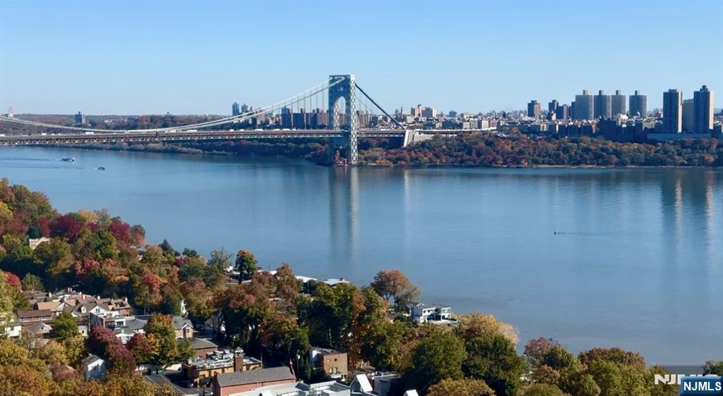 1 Horizon Road, Unit 1025 Fort Lee, NJ 07024 - Photo 2 of 27 a view of a lake and a mountain view