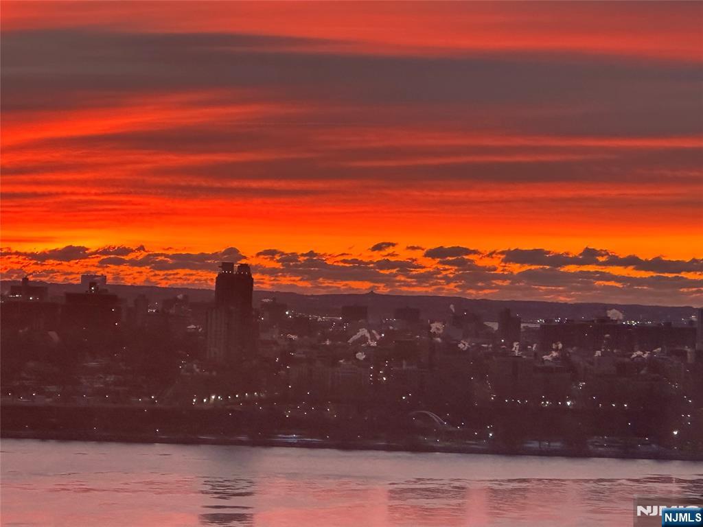 1 Horizon Road, Unit 1025 Fort Lee, NJ 07024 - Photo 27 of 27 a view of a house with a backyard