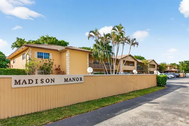 a view of a house with a park