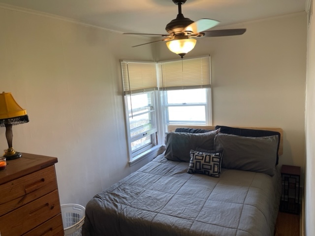 1502 Ridgeway Street Round Lake Beach, IL 60073 - Photo 8 of 11 a living room with furniture and a window