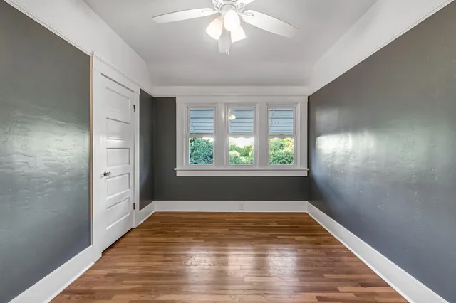 a view of a house with a bed and a patio