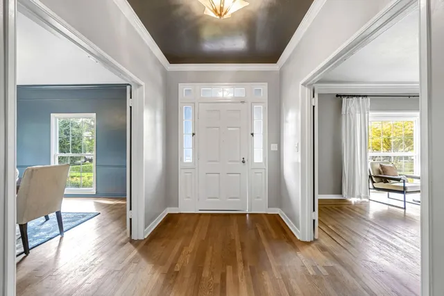 a bathroom with a mirror and a sink