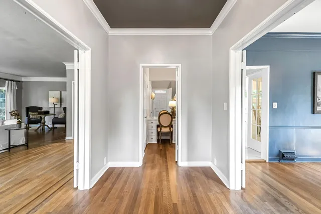 a living room with furniture or couch and a wooden floor