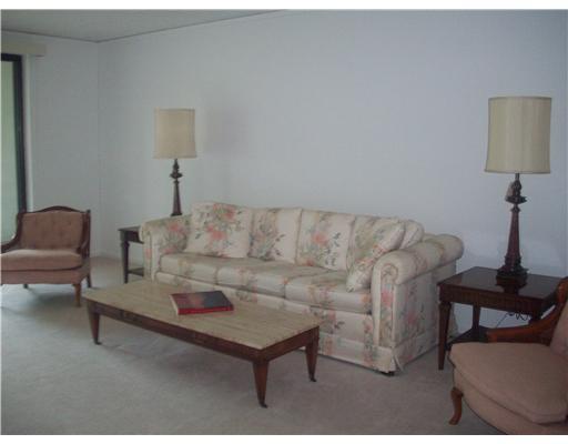 Living Room. Neutral, open living room opening to private porch with pastoral view of rear gounds