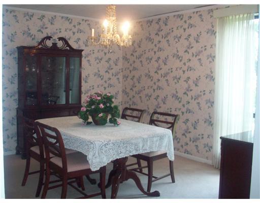 Dining Room. Spacious with seating for 12 / view of rear yard