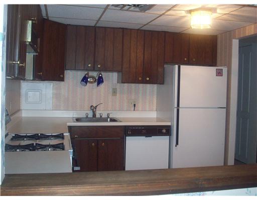 Kitchen. Fully equipped kitchen with gas stove, dishwasher, disposal, refrigerator; access from hallway or from dining room
