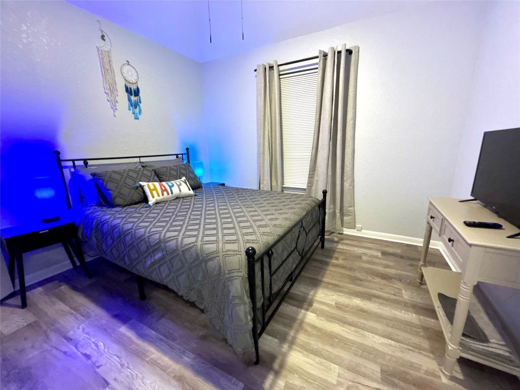 1701 Lynx Circle Harker Heights, TX 76548 - Photo 11 of 17 a bedroom with a bed and a flat screen tv