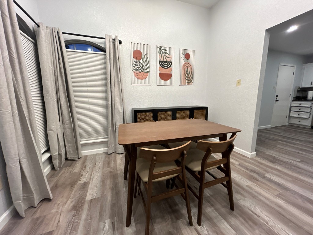 1701 Lynx Circle Harker Heights, TX 76548 - Photo 12 of 17 a view of a dining room with furniture and wooden floor