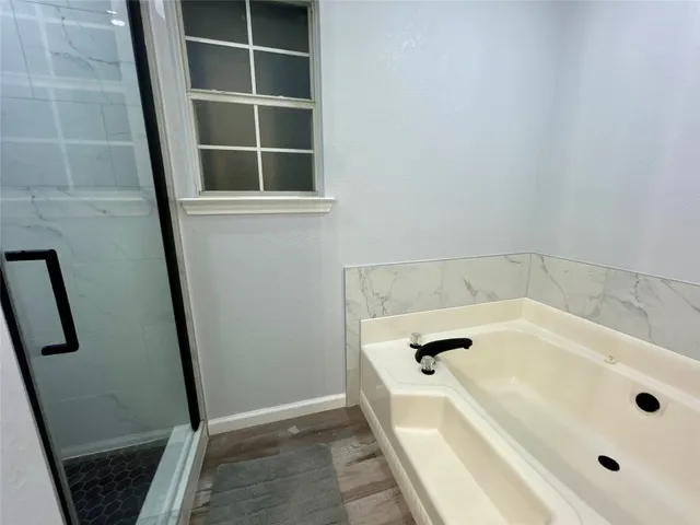 a bathroom with a bathtub