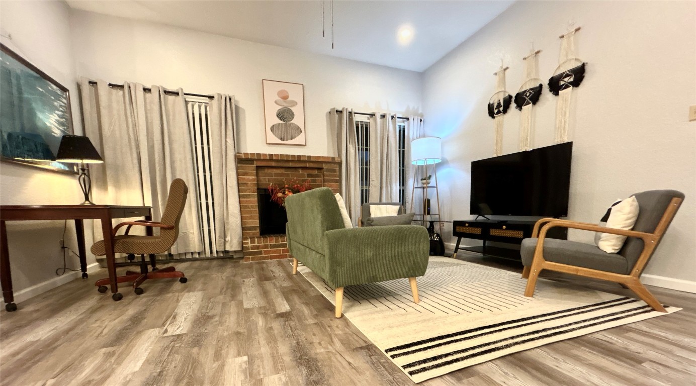 1701 Lynx Circle Harker Heights, TX 76548 - Photo 3 of 17 a living room with furniture a flat screen tv and a refrigerator