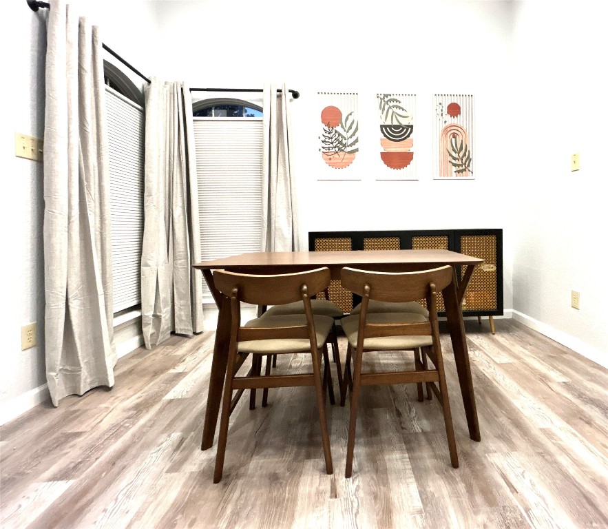 1701 Lynx Circle Harker Heights, TX 76548 - Photo 4 of 17 a view of a dining area with furniture and wooden floor