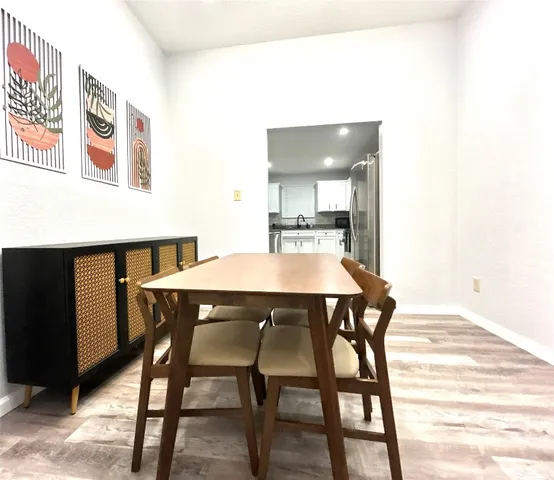 a view of a dining room with furniture