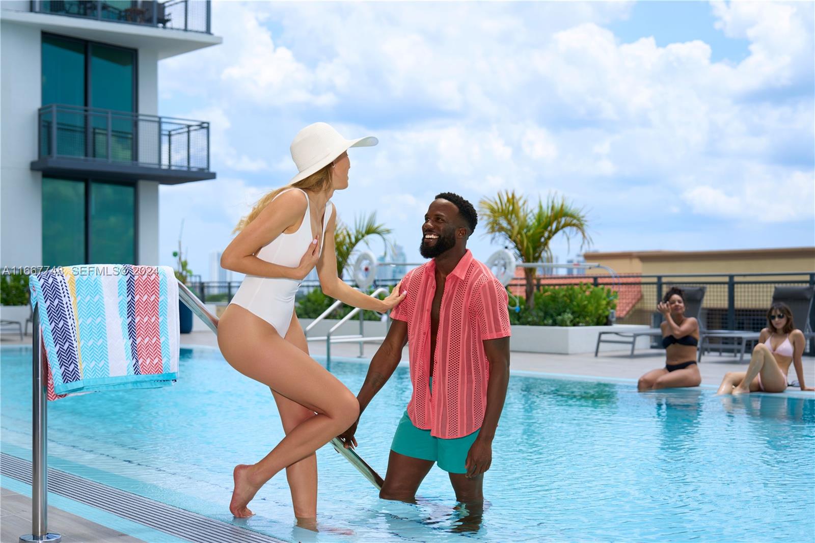 1809 Jackson Street, Unit 1002 Hollywood, FL 33020 - Photo 1 of 46 swimming pool with outdoor seating