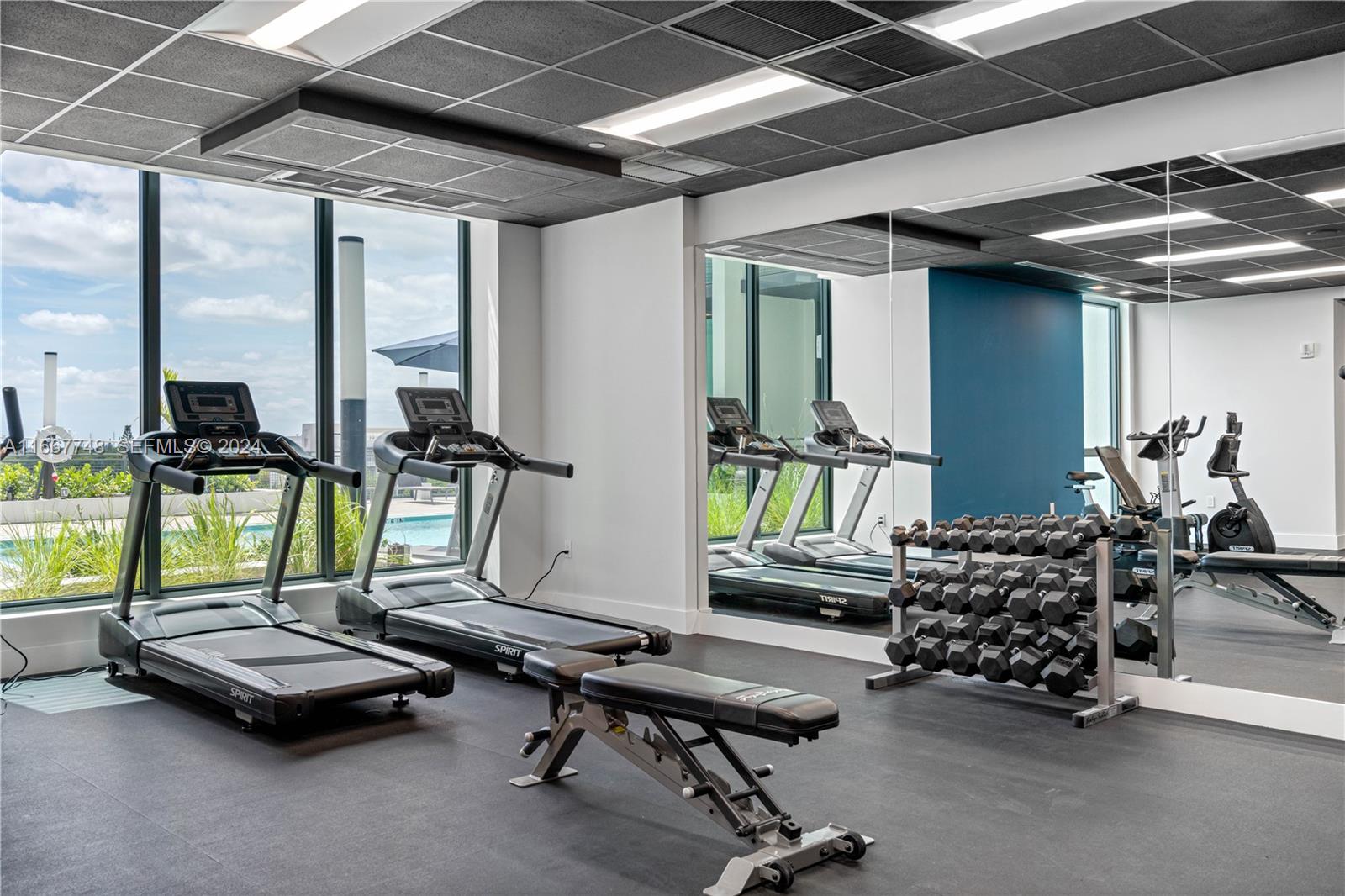 1809 Jackson Street, Unit 1002 Hollywood, FL 33020 - Photo 18 of 46 a room with gym equipment