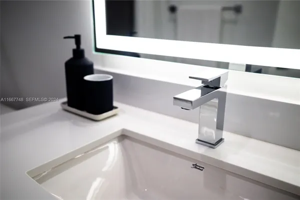 a bathroom with a bathtub and a toilet