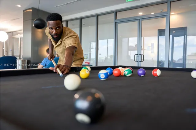a view of a workspace with furniture and a yard