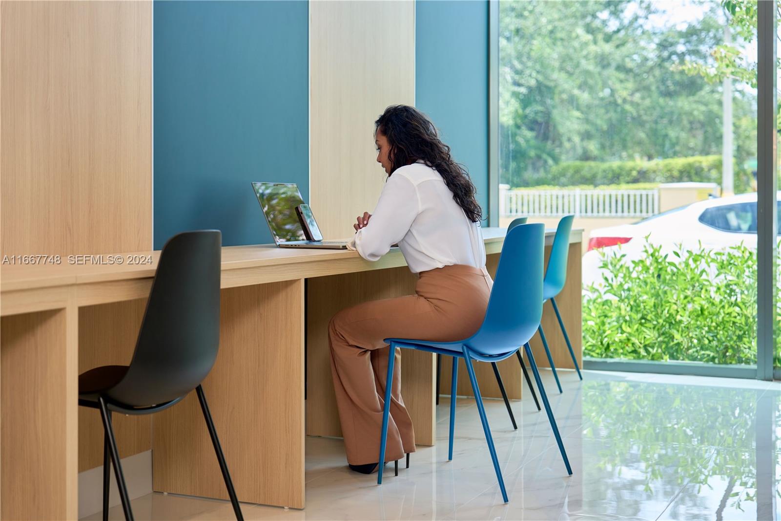 1809 Jackson Street, Unit 1002 Hollywood, FL 33020 - Photo 10 of 46 a sitting area with furniture and garden view