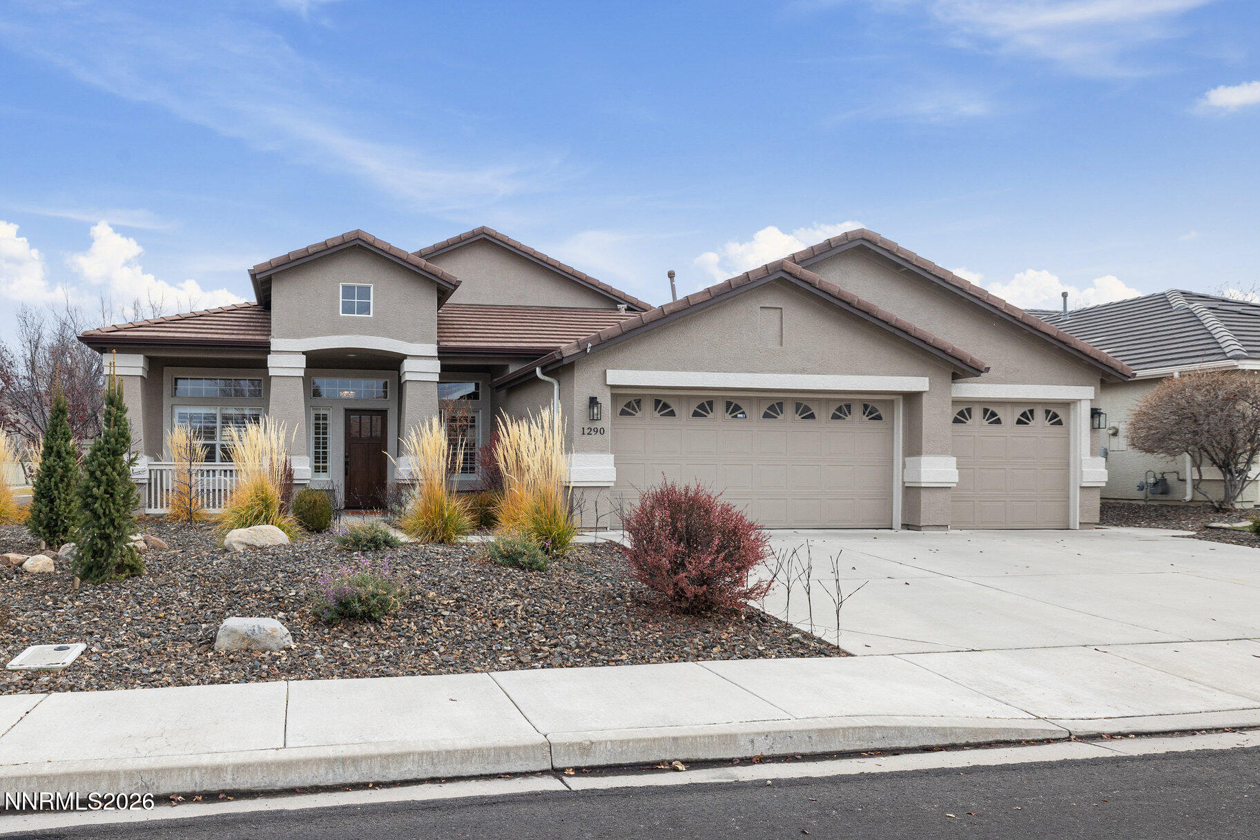 1290 El Monte Court Reno, NV 89521 - Photo 1 of 37 a front view of a house with garden