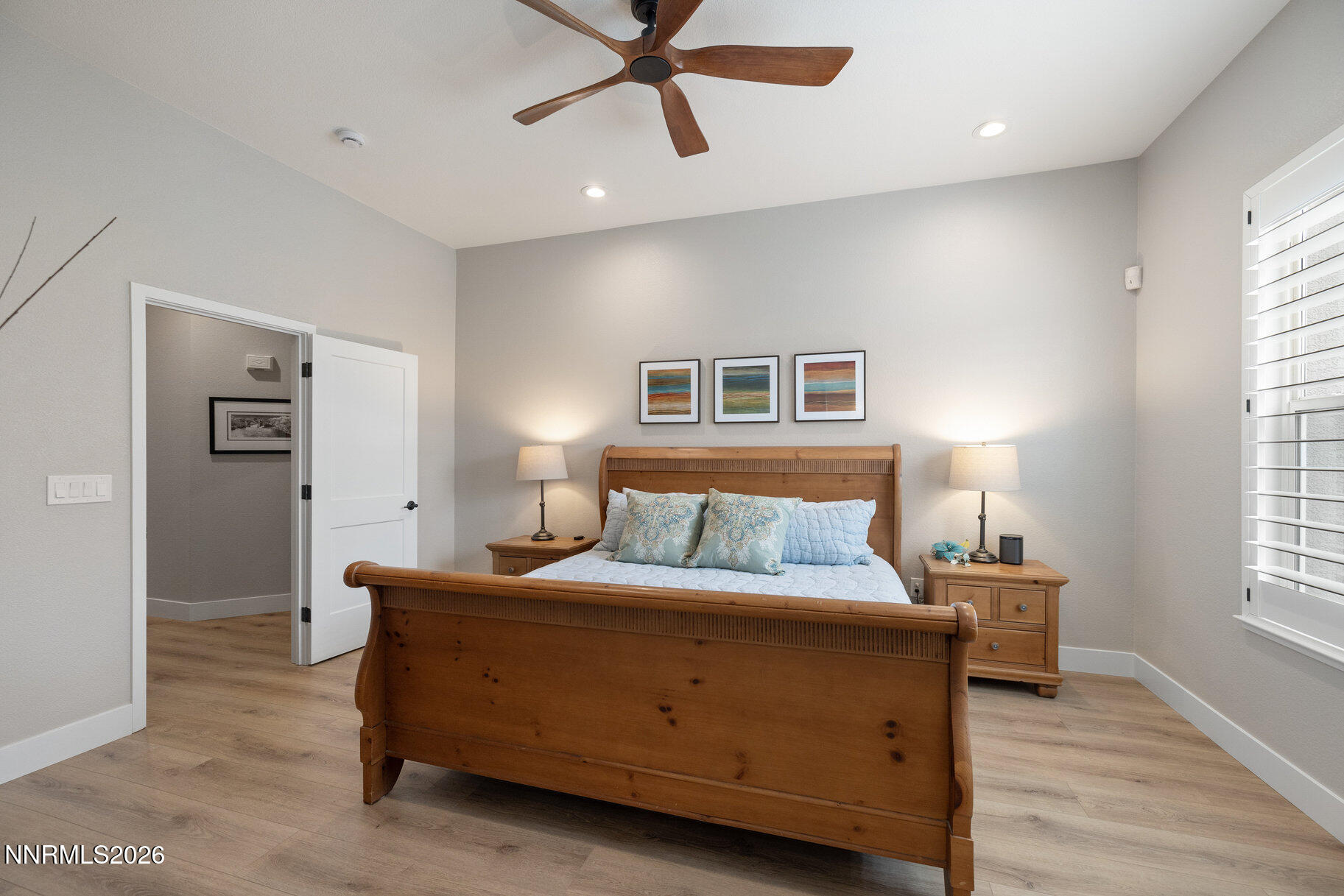 1290 El Monte Court Reno, NV 89521 - Photo 14 of 37 a bedroom with a bed and window