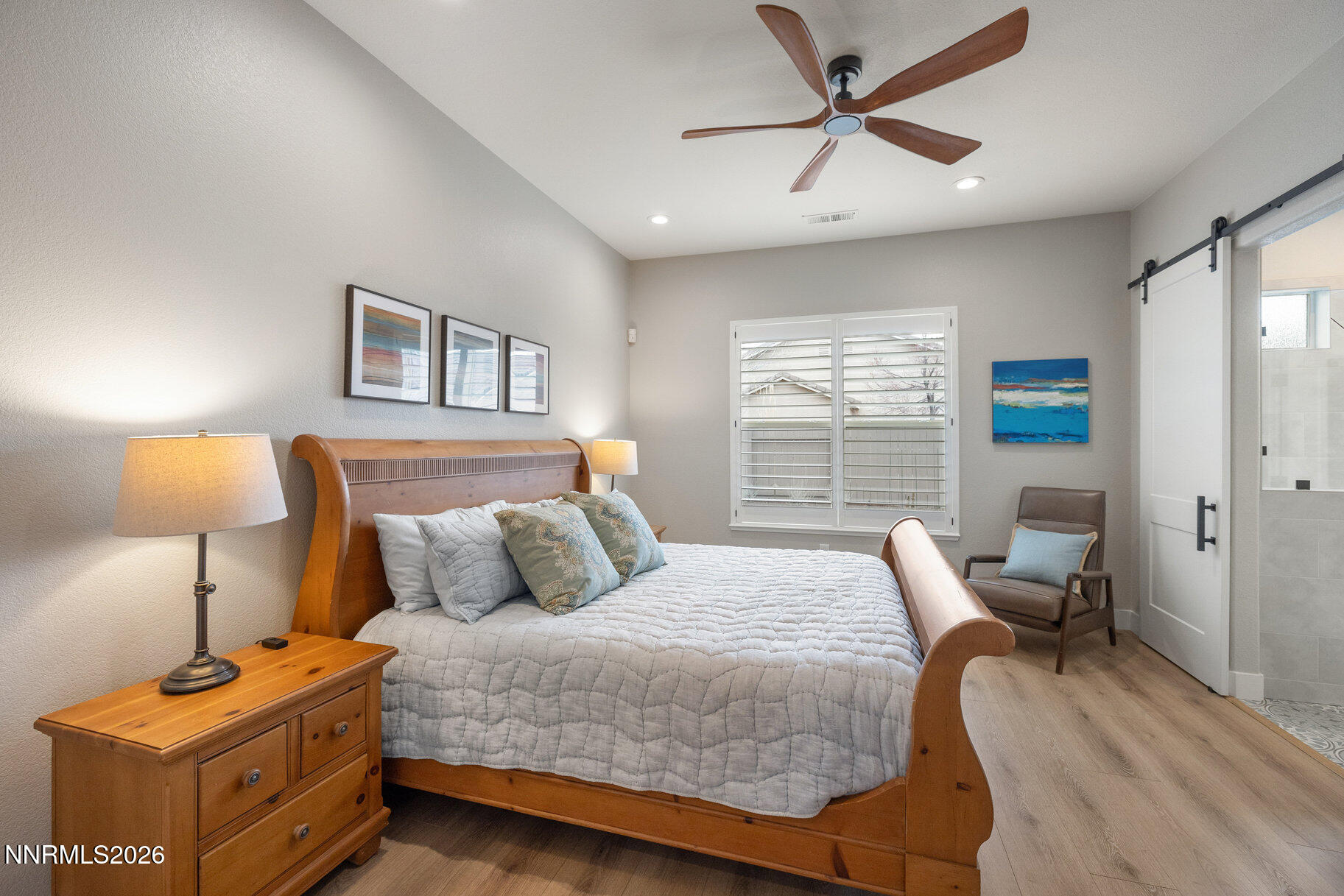 1290 El Monte Court Reno, NV 89521 - Photo 15 of 37 a bedroom with a bed and a window