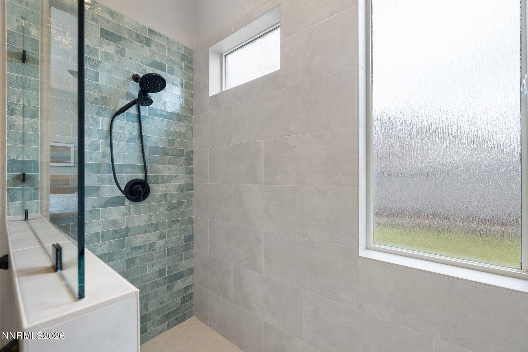 1290 El Monte Court Reno, NV 89521 - Photo 18 of 37 a bathroom with a shower