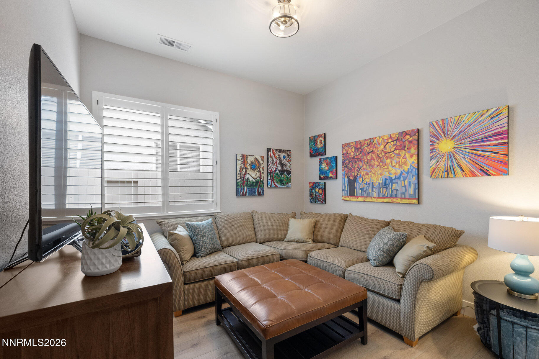 1290 El Monte Court Reno, NV 89521 - Photo 24 of 37 a living room with furniture and a large window