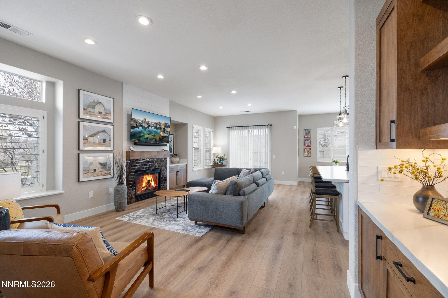 1290 El Monte Court Reno, NV 89521 - Photo 3 of 37 a living room with furniture and a fireplace