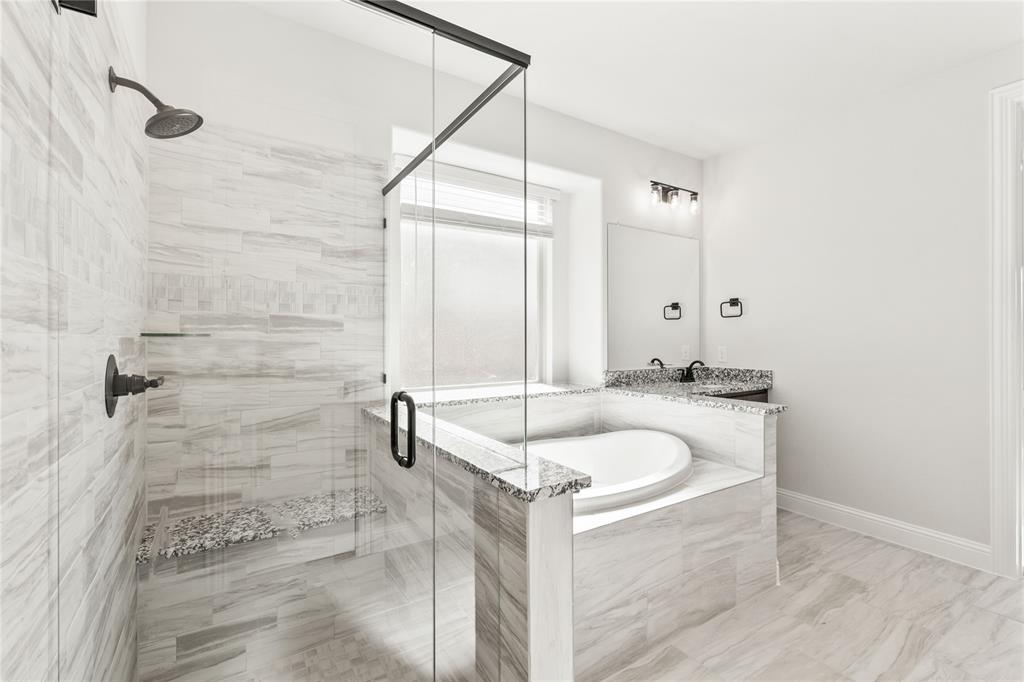 4213 Bel Air Drive Midlothian, TX 76065 - Photo 22 of 40 a bathroom with a granite countertop sink and a mirror