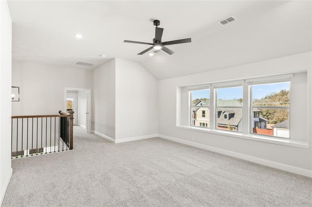 4213 Bel Air Drive Midlothian, TX 76065 - Photo 28 of 40 an empty room with windows and fan