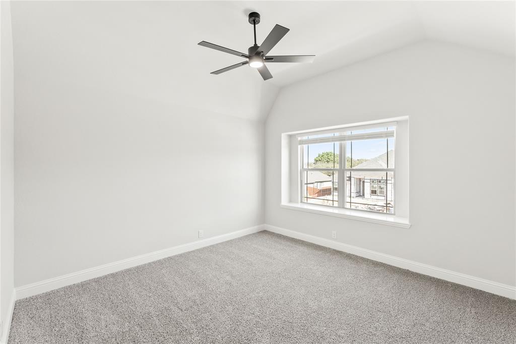 4213 Bel Air Drive Midlothian, TX 76065 - Photo 29 of 40 an empty room with a window and a fan