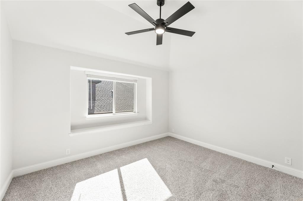 4213 Bel Air Drive Midlothian, TX 76065 - Photo 32 of 40 an empty room with a window and a fan
