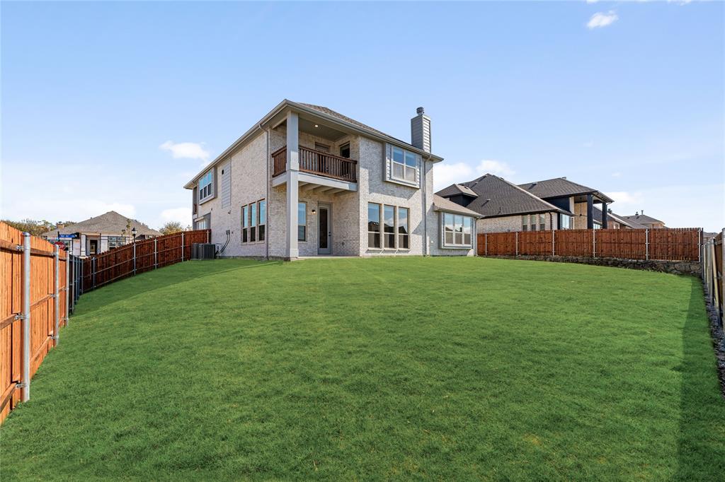 4213 Bel Air Drive Midlothian, TX 76065 - Photo 39 of 40 a front view of a house with garden