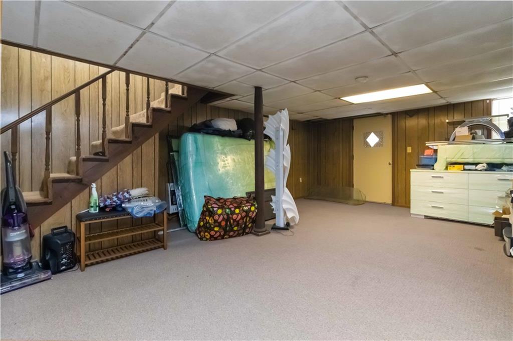 3829 Reynolds Road Douglasville, GA 30135 - Photo 16 of 24 a living room with furniture and a chandelier