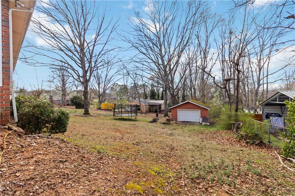 3829 Reynolds Road Douglasville, GA 30135 - Photo 20 of 24 a house that has tree in front of it