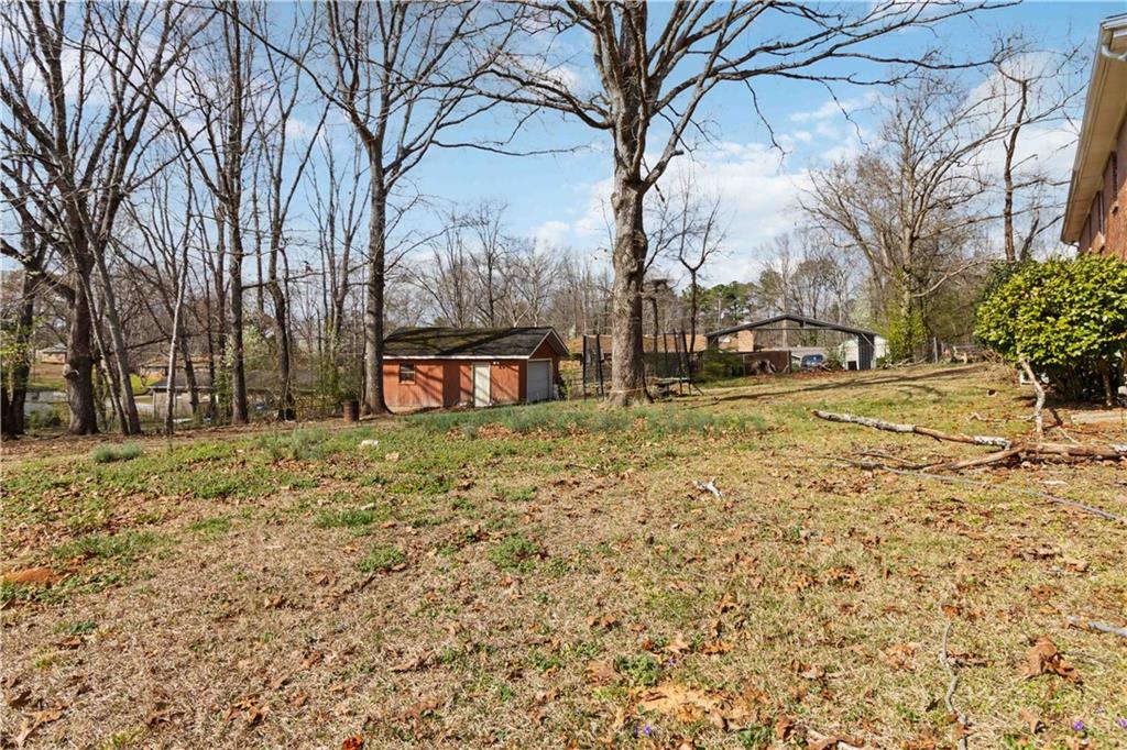 3829 Reynolds Road Douglasville, GA 30135 - Photo 22 of 24 a view of a yard with a house
