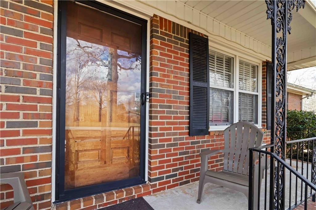 3829 Reynolds Road Douglasville, GA 30135 - Photo 4 of 24 a view of a brick house with a large window