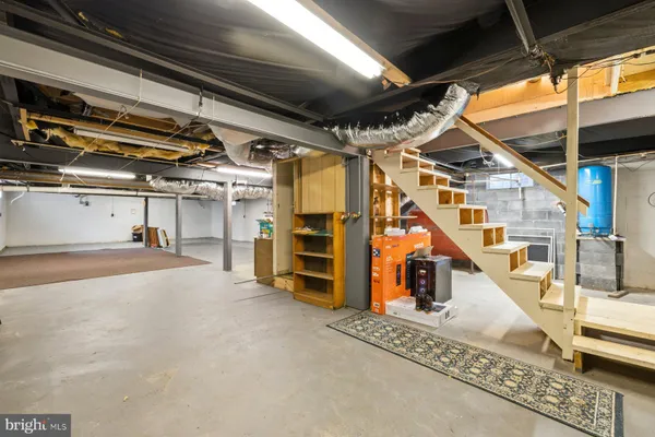 a view of a garage with wooden floors