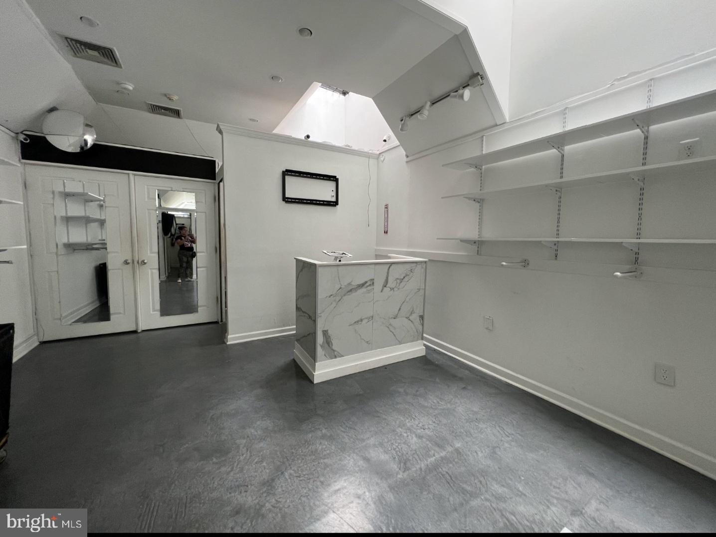 1509 Spring Garden Street Philadelphia, PA 19130 - Photo 5 of 13 an empty room with windows