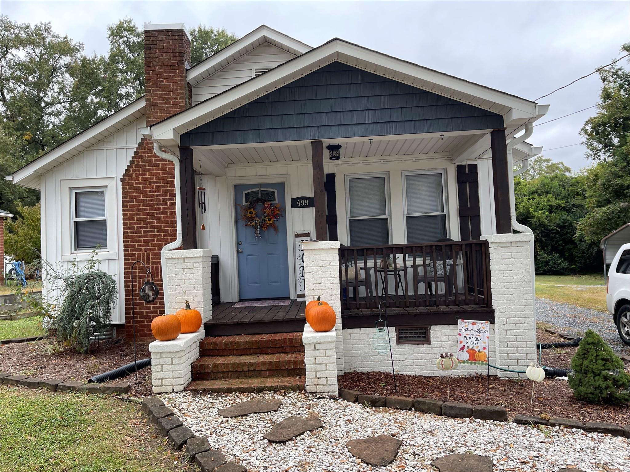 499 Union Cemetery Road Southwest Concord, NC 28027 - Photo 1 of 19 a front view of a house