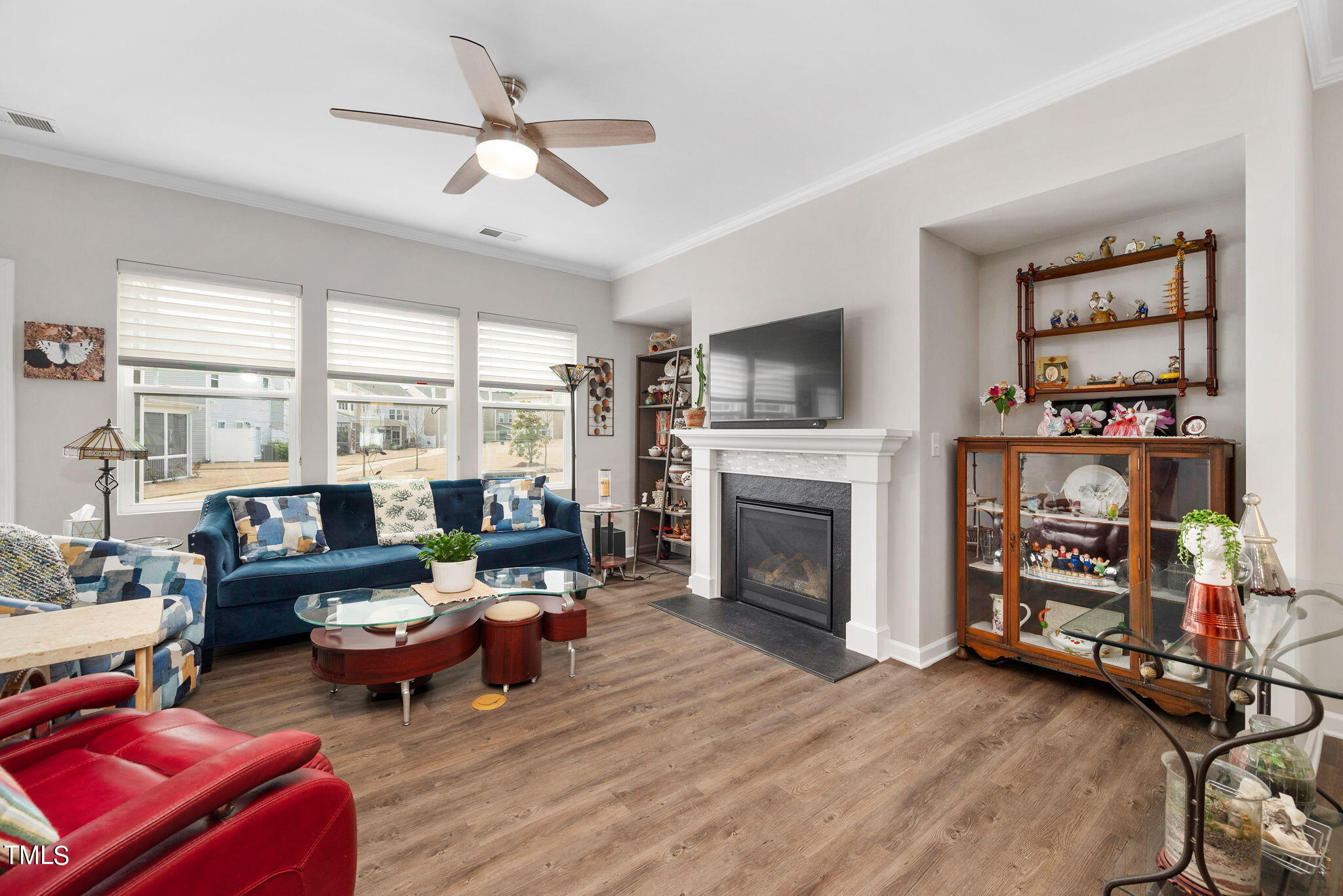 1016 Epiphany Road Morrisville, NC 27560 - Photo 12 of 45 a living room with furniture and a fireplace