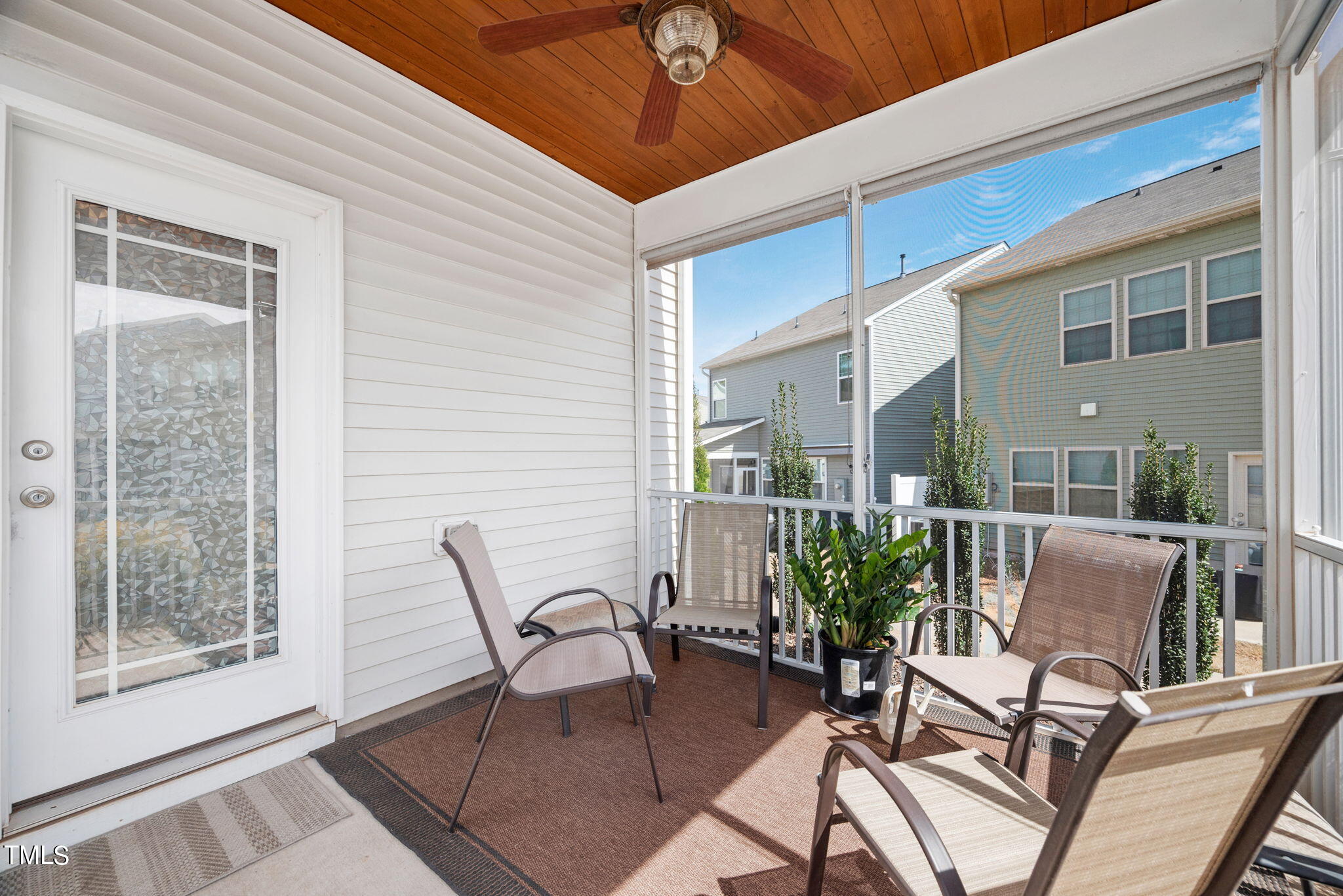 1016 Epiphany Road Morrisville, NC 27560 - Photo 13 of 45 a view of a patio with table and chairs and potted plants